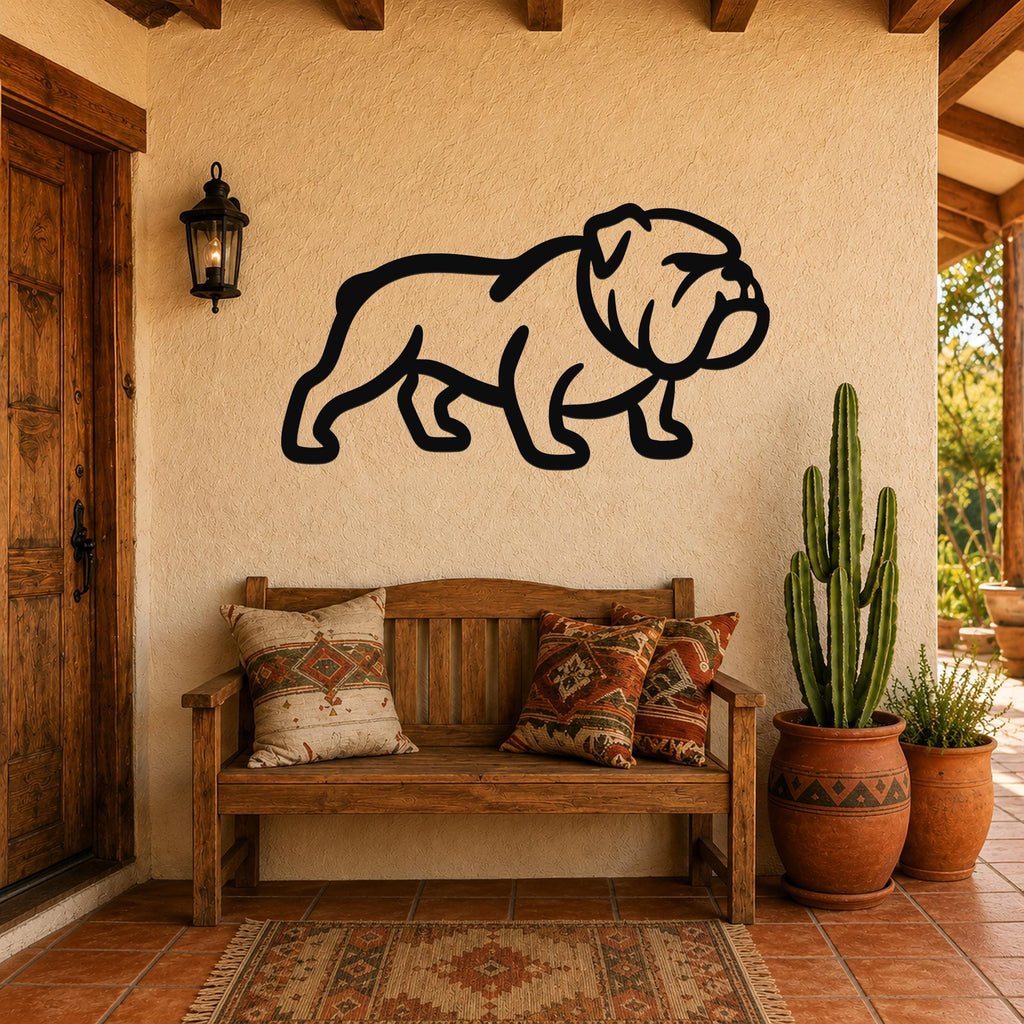 Black metal bulldog wall art silhouette mounted on a stucco wall above a wooden bench in a patio entryway.