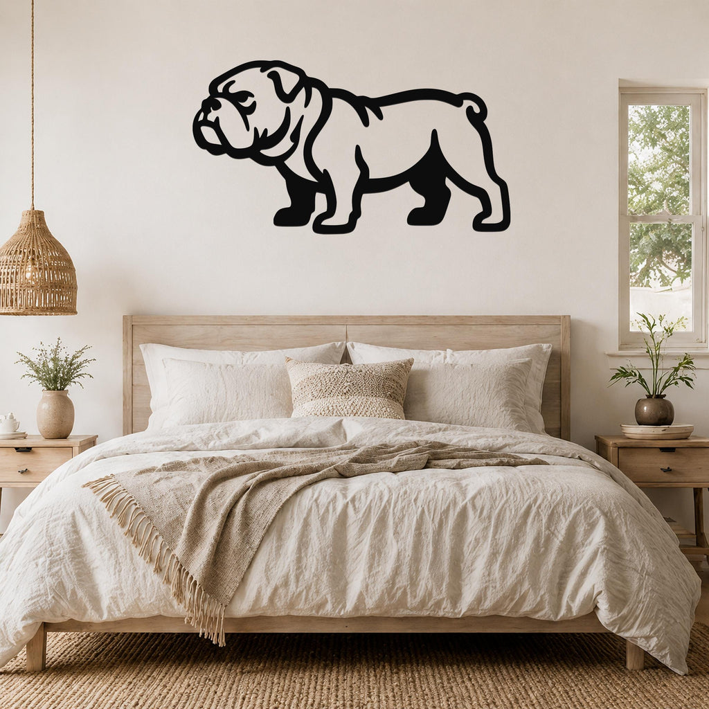 Black metal bulldog wall art in silhouette style, mounted above a wooden bed in a neutral bedroom.