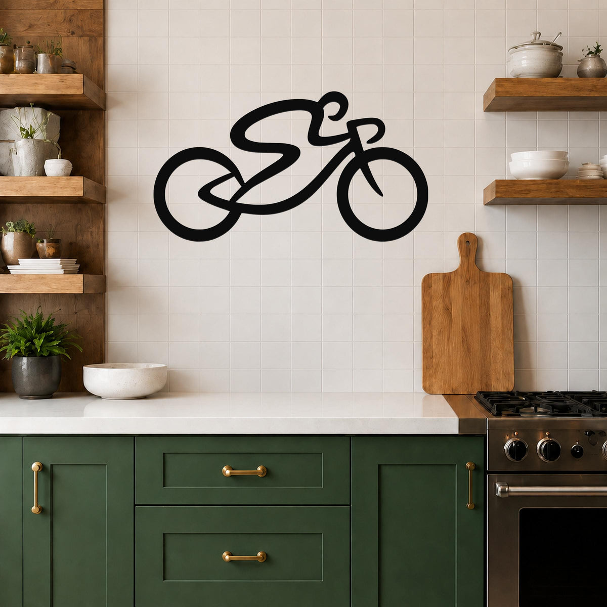 Black metal bicycle wall art with a bold silhouette and dynamic motion lines, mounted on a tiled kitchen wall above a counter.