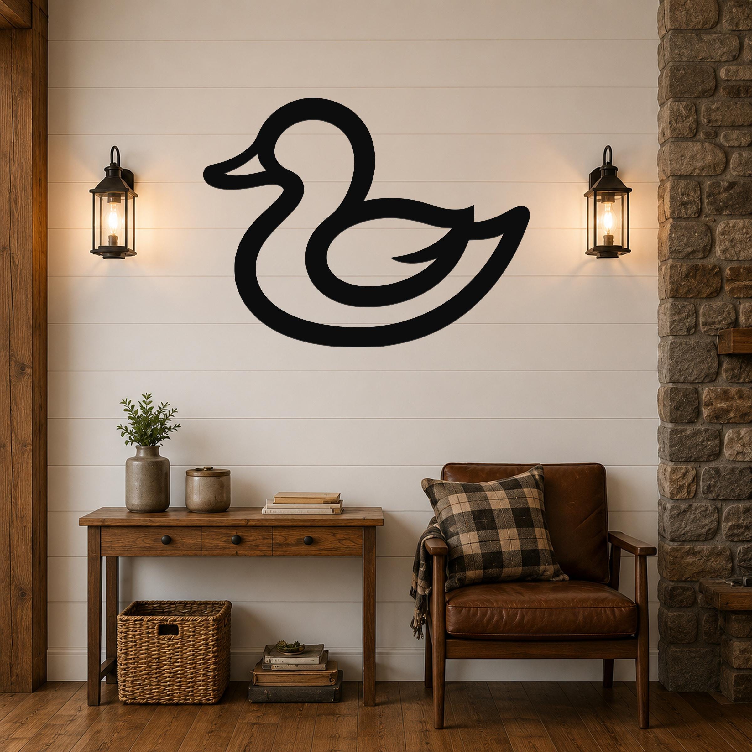 Black metal duck silhouette wall art mounted on a shiplap wall above a wooden console table in a living room.