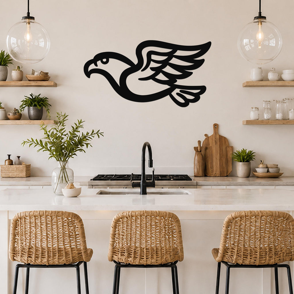 Black metal eagle wall art with a bold silhouette and detailed wing cutouts, mounted on a kitchen wall above a counter.
