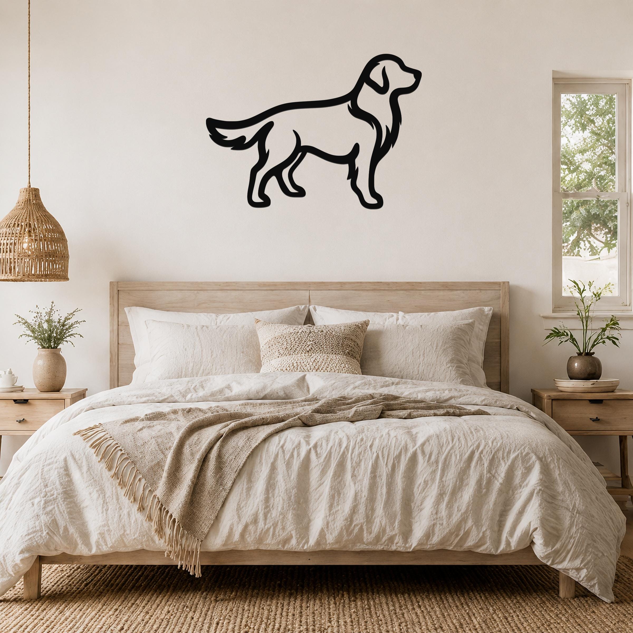 Black metal Golden Retriever silhouette wall art mounted above a wooden bed in a neutral bedroom.