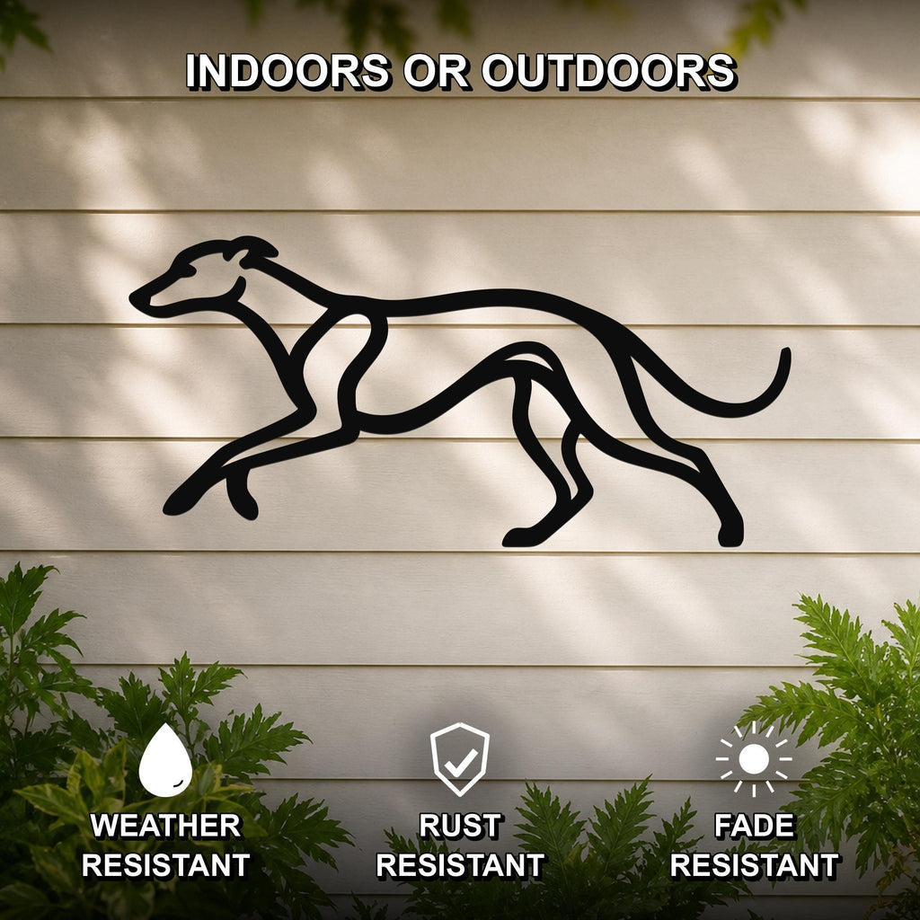 Black metal greyhound silhouette wall art with motion-line cutouts, mounted on a light-colored outdoor wall above green plants.