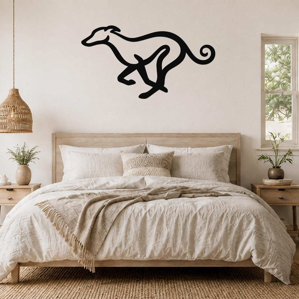 Black metal greyhound wall art in a running silhouette, mounted above a wooden bed in a neutral bedroom.