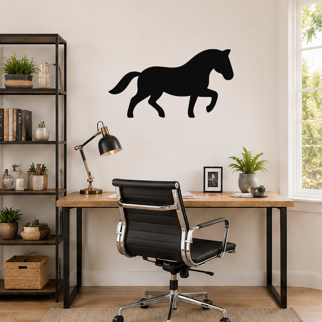 Black metal horse silhouette wall art mounted above a wooden desk in a modern home office.