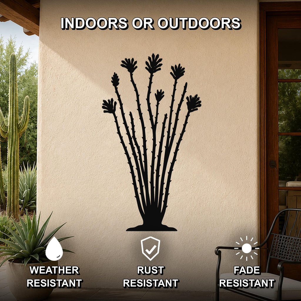 Black metal ocotillo wall sculpture with spiny branches and flower cutouts, mounted on an outdoor patio wall.