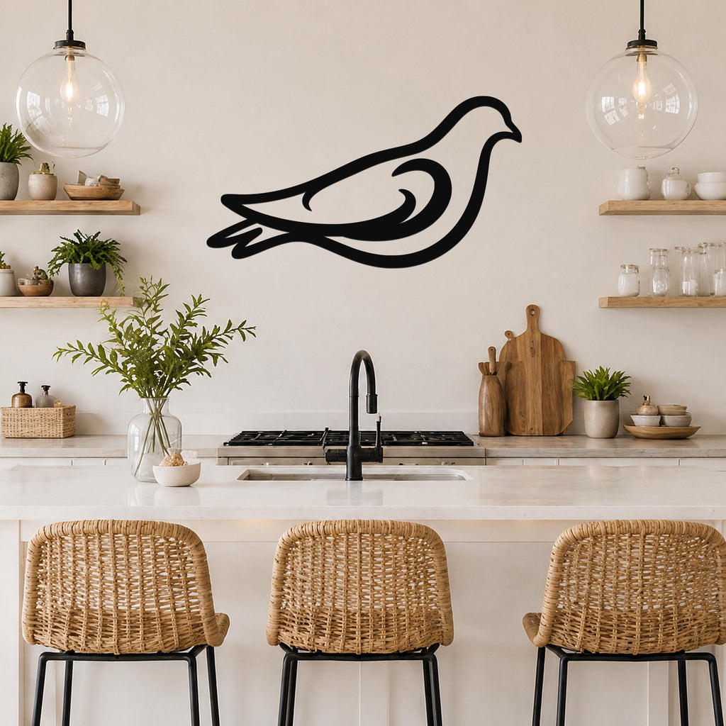 Black metal pigeon wall art with flowing silhouette lines, mounted above a kitchen counter between two glass pendant lights.