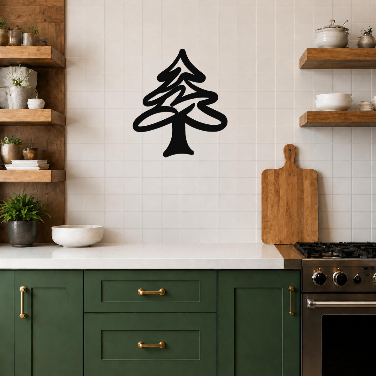 Black metal pine tree wall art with layered branch cutouts, mounted on a tiled kitchen wall above a counter.