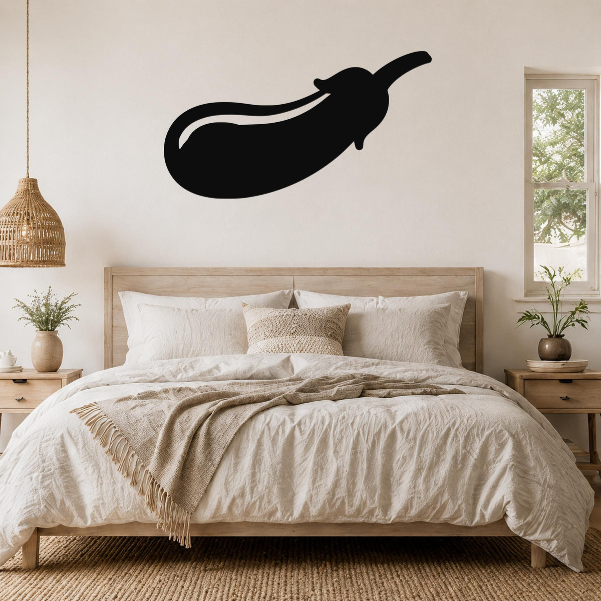 Black metal eggplant wall art silhouette mounted above a bed in a neutral bedroom.