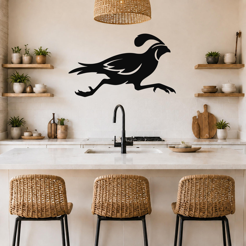 Black metal quail wall art with motion-line cutouts, mounted above a kitchen counter in a modern kitchen.