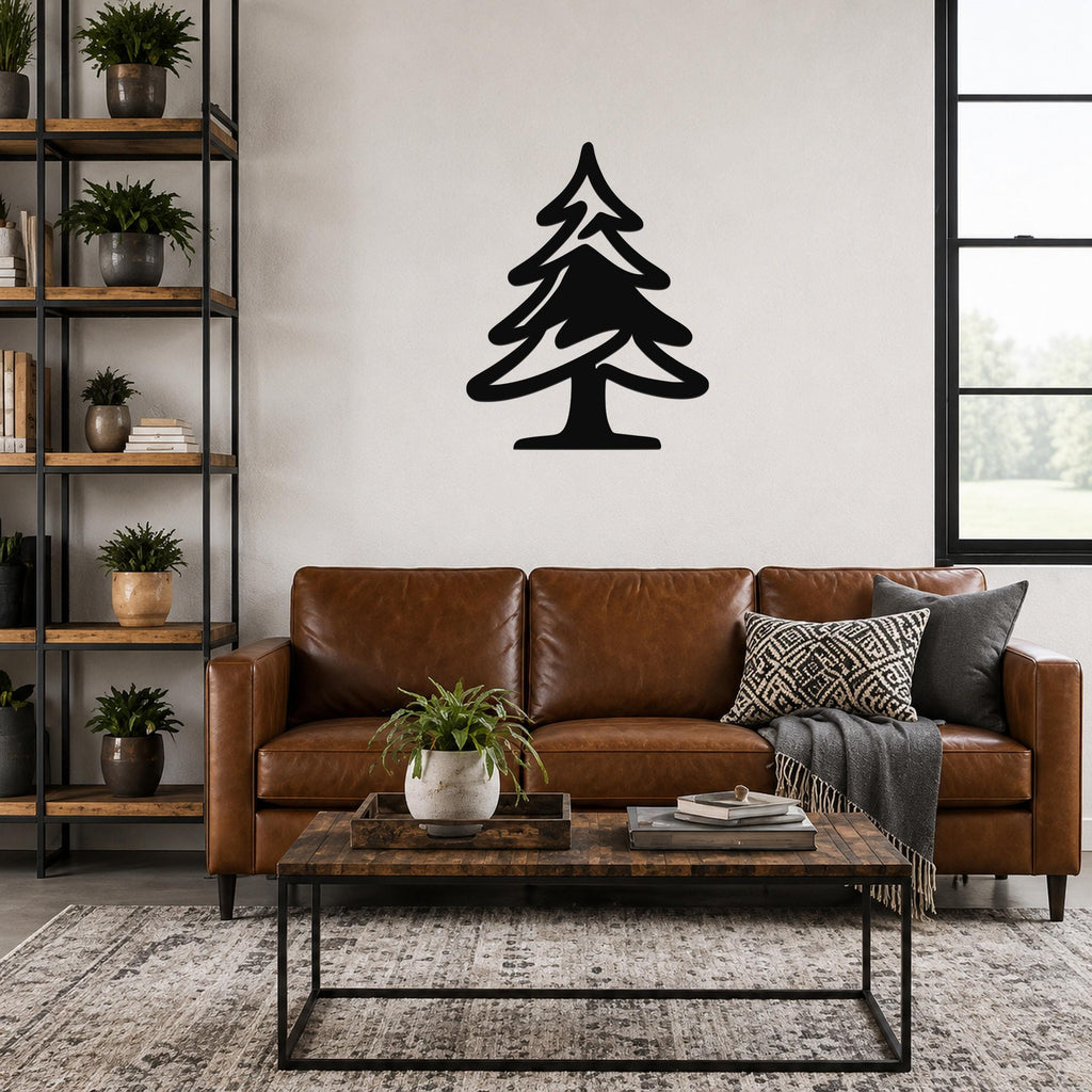 Black metal pine tree wall art with a silhouette cutout, mounted on a living room wall above a brown leather sofa.