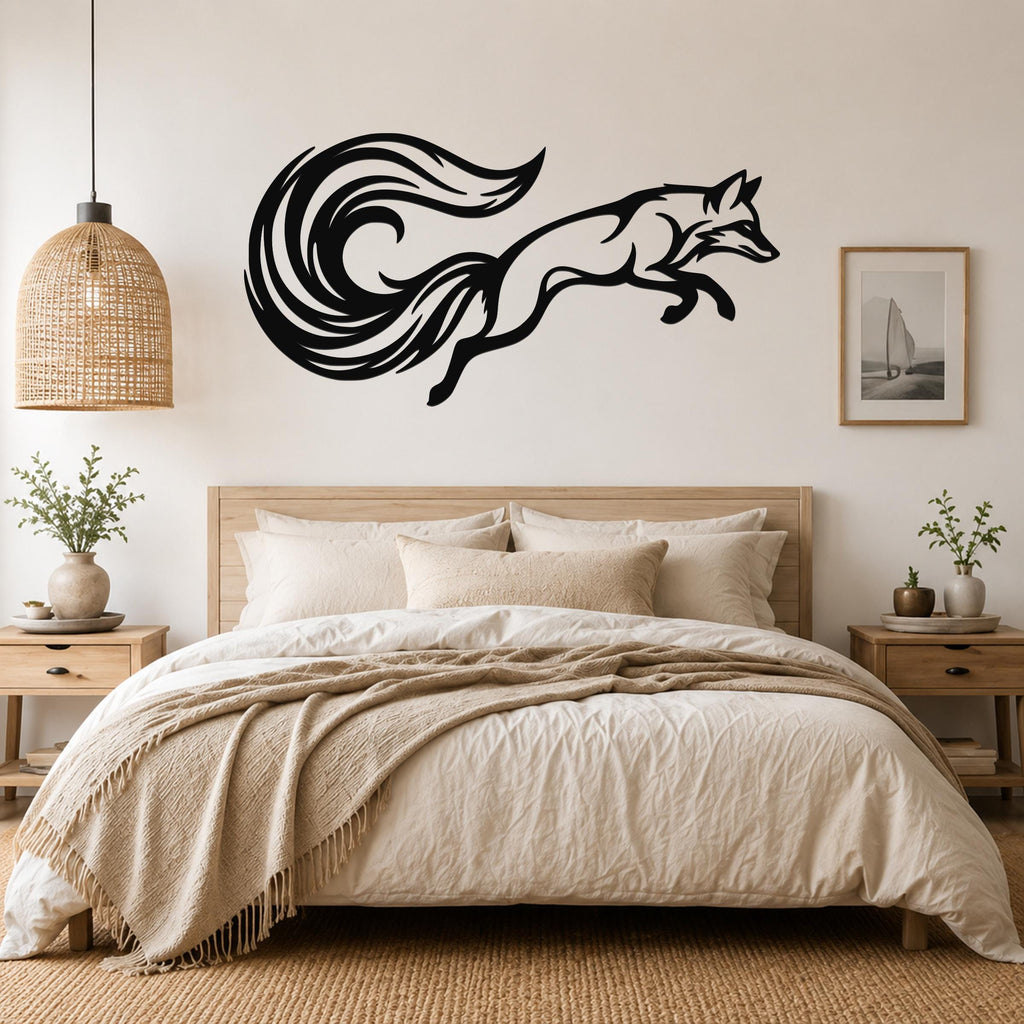 Black metal fox wall art with a swirling tail silhouette, mounted above a bed in a neutral bedroom.