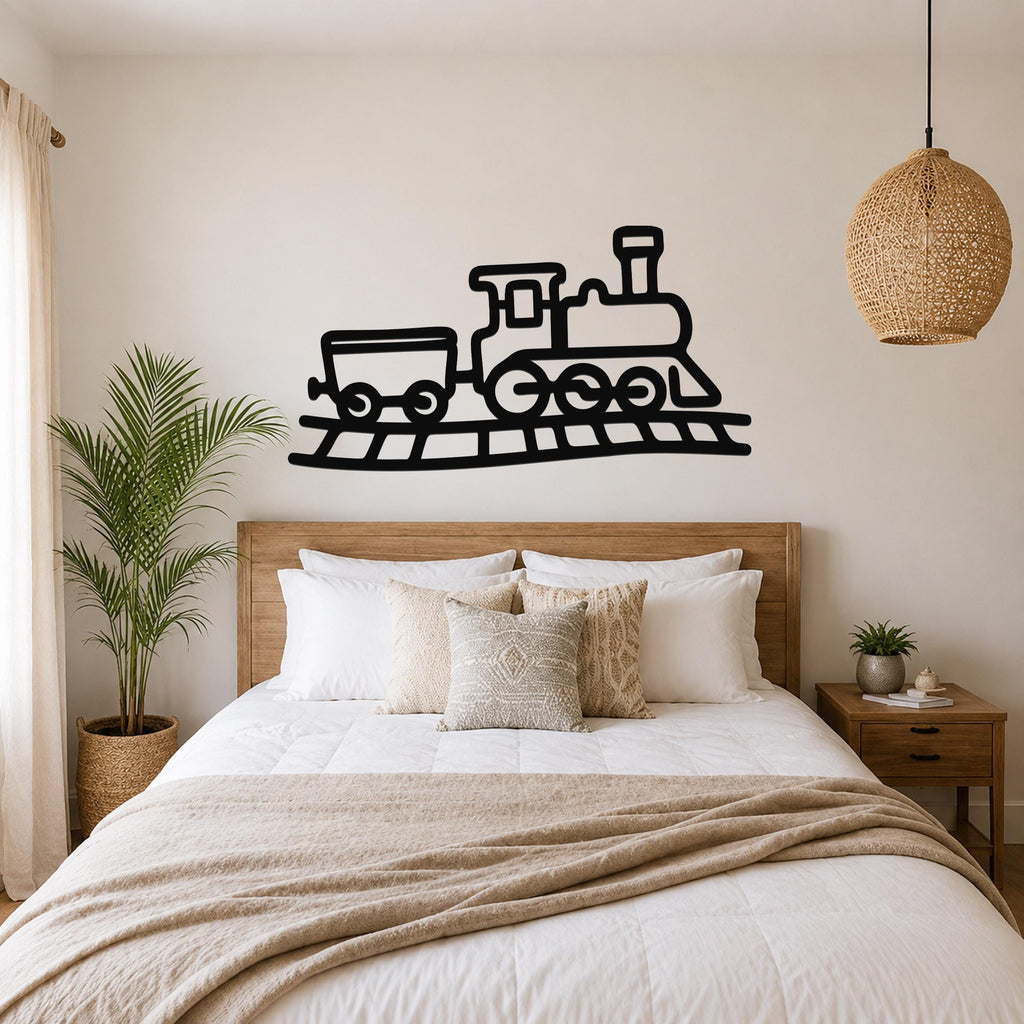 Black metal train wall art with a classic locomotive and car silhouette, mounted above a wooden bed in a neutral bedroom.