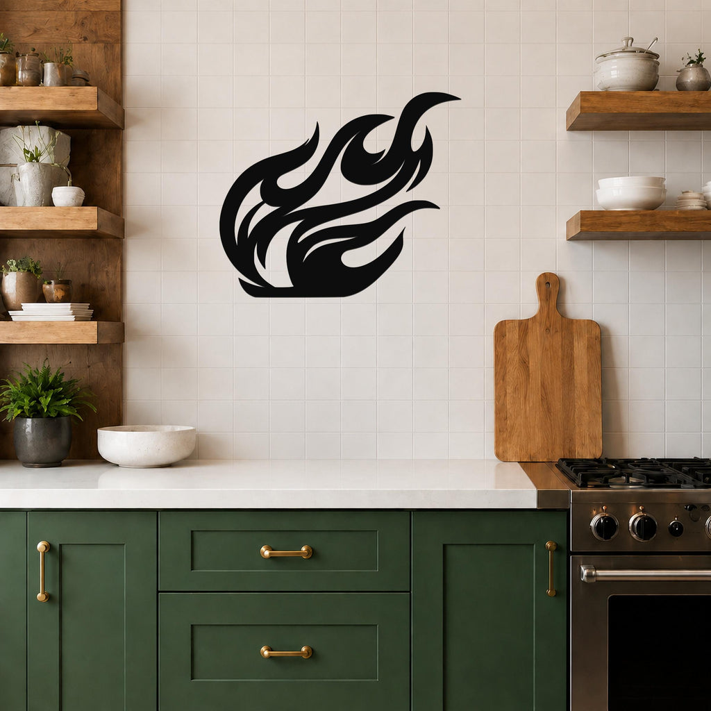 Black metal flame wall art with flowing silhouette cutouts, mounted on a tiled kitchen wall above a counter.
