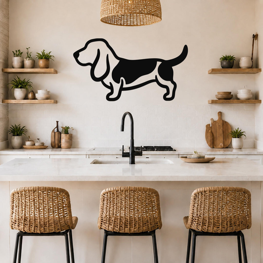 Black metal Basset Hound silhouette wall art mounted on a kitchen wall above a counter, with a wicker pendant light and wooden shelves visible.