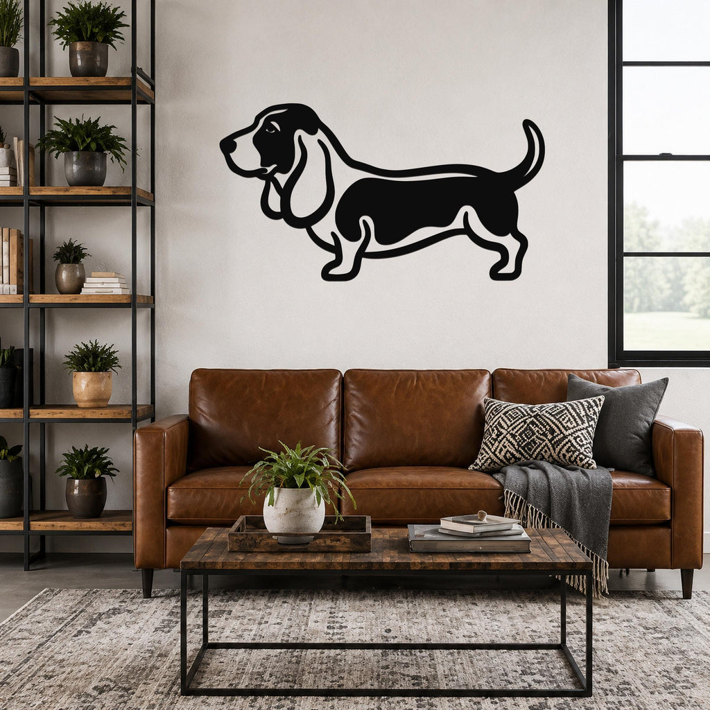Black metal Basset Hound wall art silhouette mounted above a brown leather sofa in a living room.