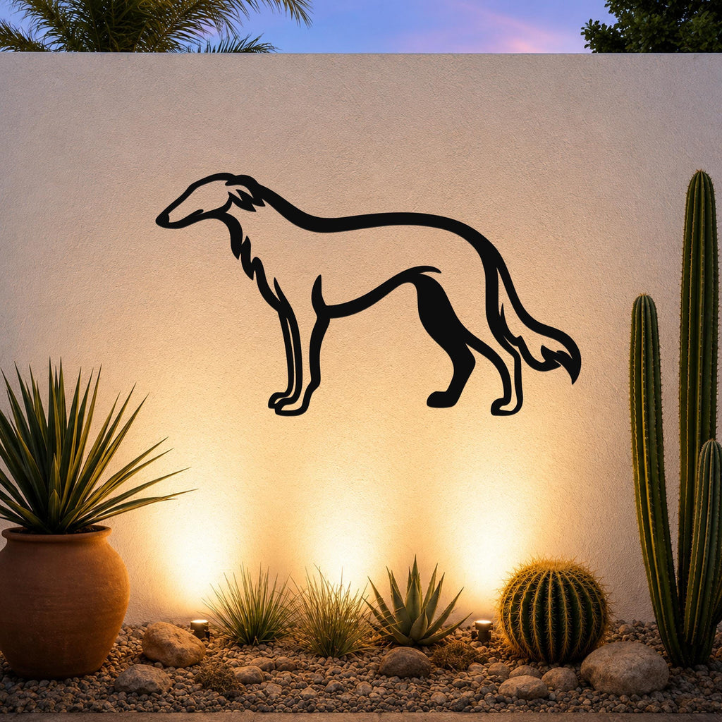 Black metal Borzoi dog silhouette wall art mounted on an outdoor wall above a desert garden with cacti and warm uplighting.