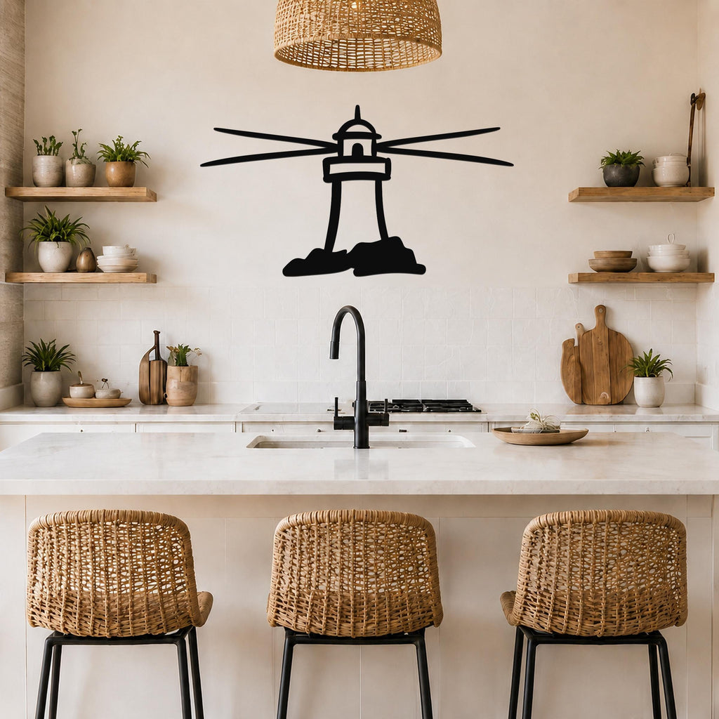 Black metal lighthouse wall art with horizontal ray cutouts, mounted on a kitchen wall above a counter.
