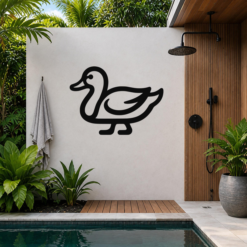 Black metal duck wall art silhouette mounted on a light-colored outdoor wall beside a wooden shower enclosure and pool.