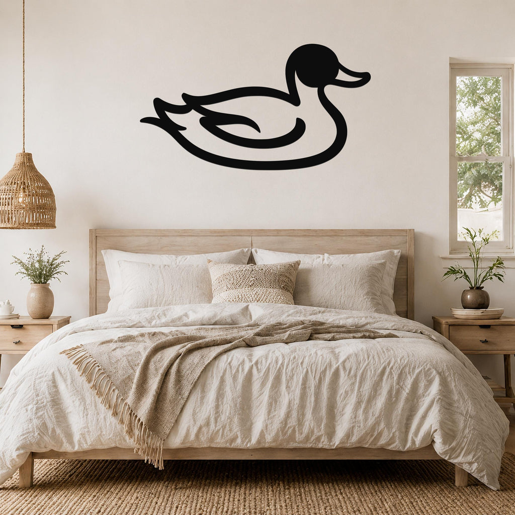 Black metal duck wall art silhouette mounted above a wooden bed in a neutral bedroom.