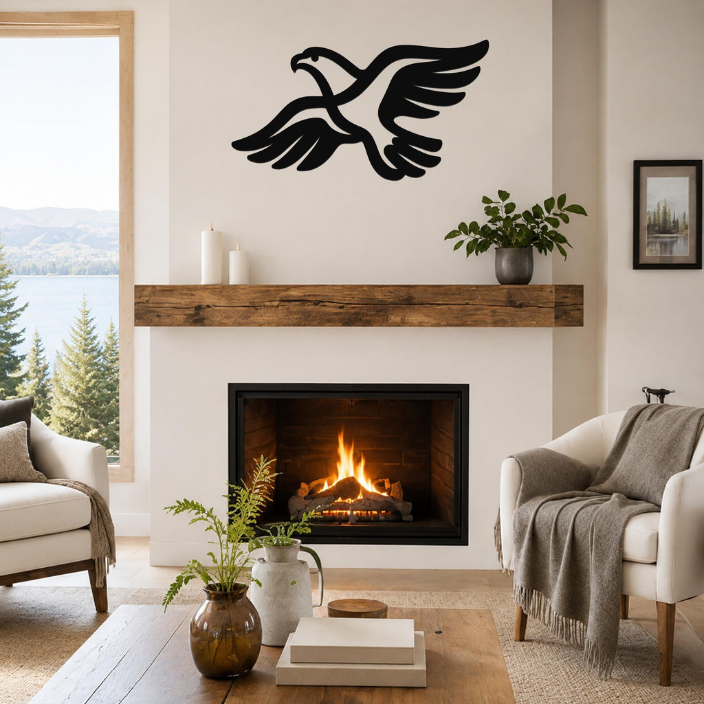Black metal eagle wall art with outstretched wings and detailed feather cutouts, mounted above a fireplace in a living room with a lake view.