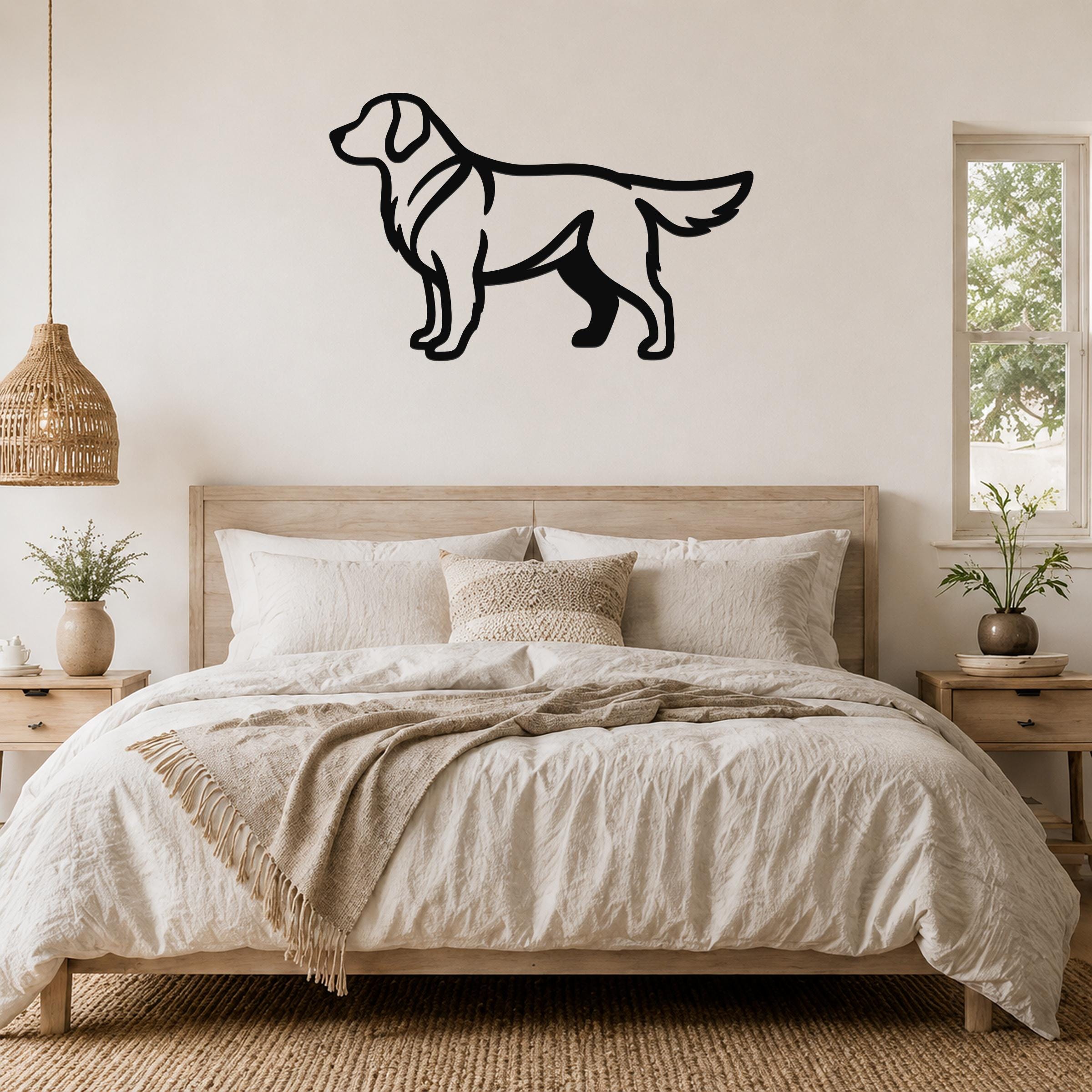 Black metal Golden Retriever wall art in silhouette style, mounted above a wooden bed in a neutral bedroom.