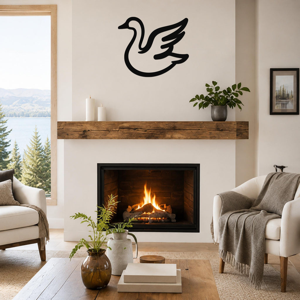 Black metal goose wall art silhouette with motion-line cutouts, mounted above a fireplace in a living room.