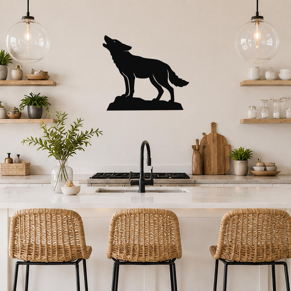 Black metal coyote wall art in a howling silhouette, mounted on a kitchen wall above a counter with wicker bar stools.