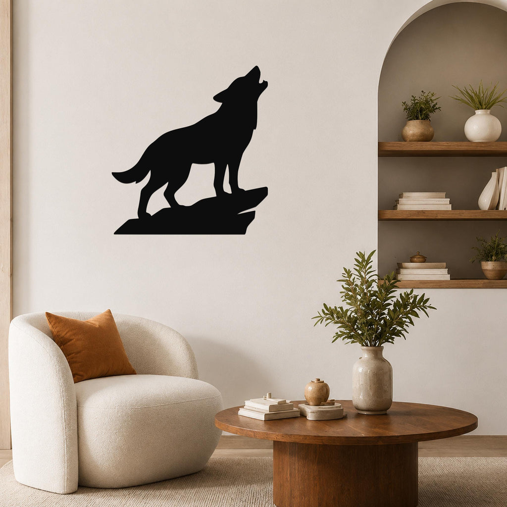 Black metal coyote wall art in a howling silhouette, mounted on a living room wall above a white armchair.