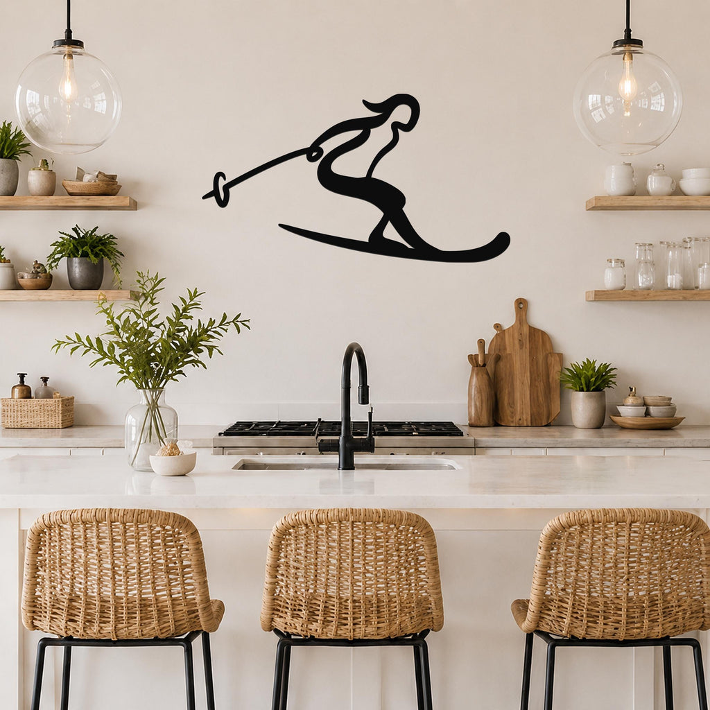Black metal wall art of a skier silhouette with ski poles, mounted on a kitchen wall above a counter.
