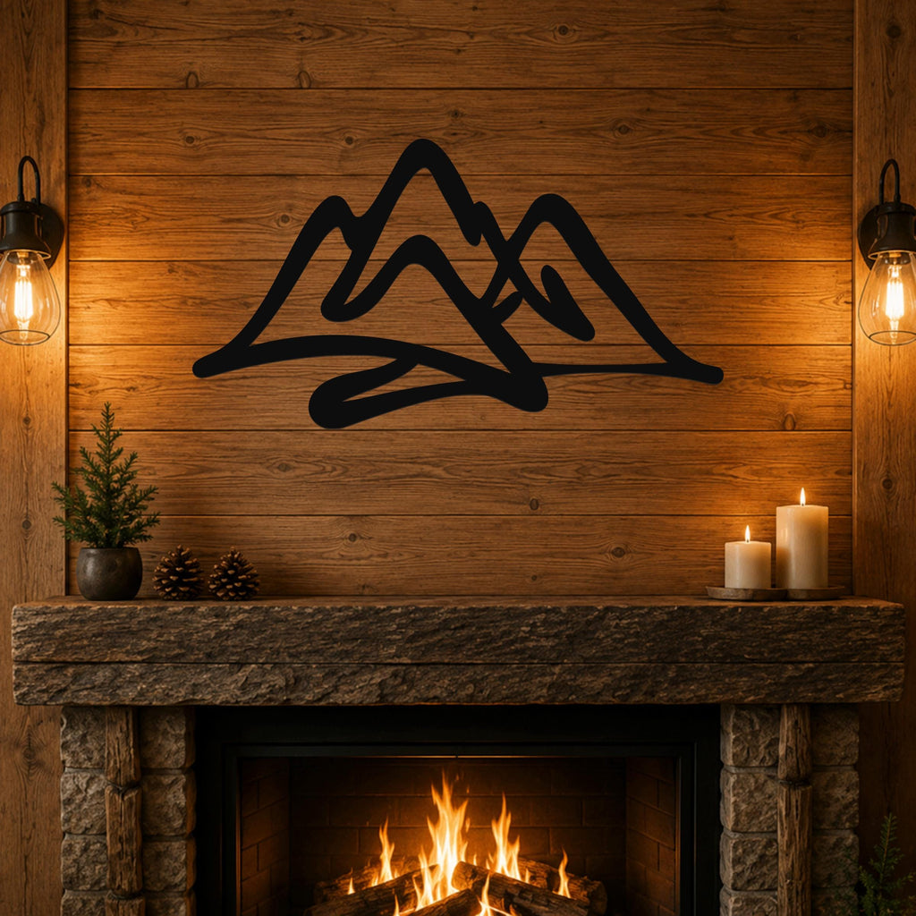 Black metal mountain silhouette wall art with layered peaks, mounted above a stone fireplace in a rustic cabin living room.
