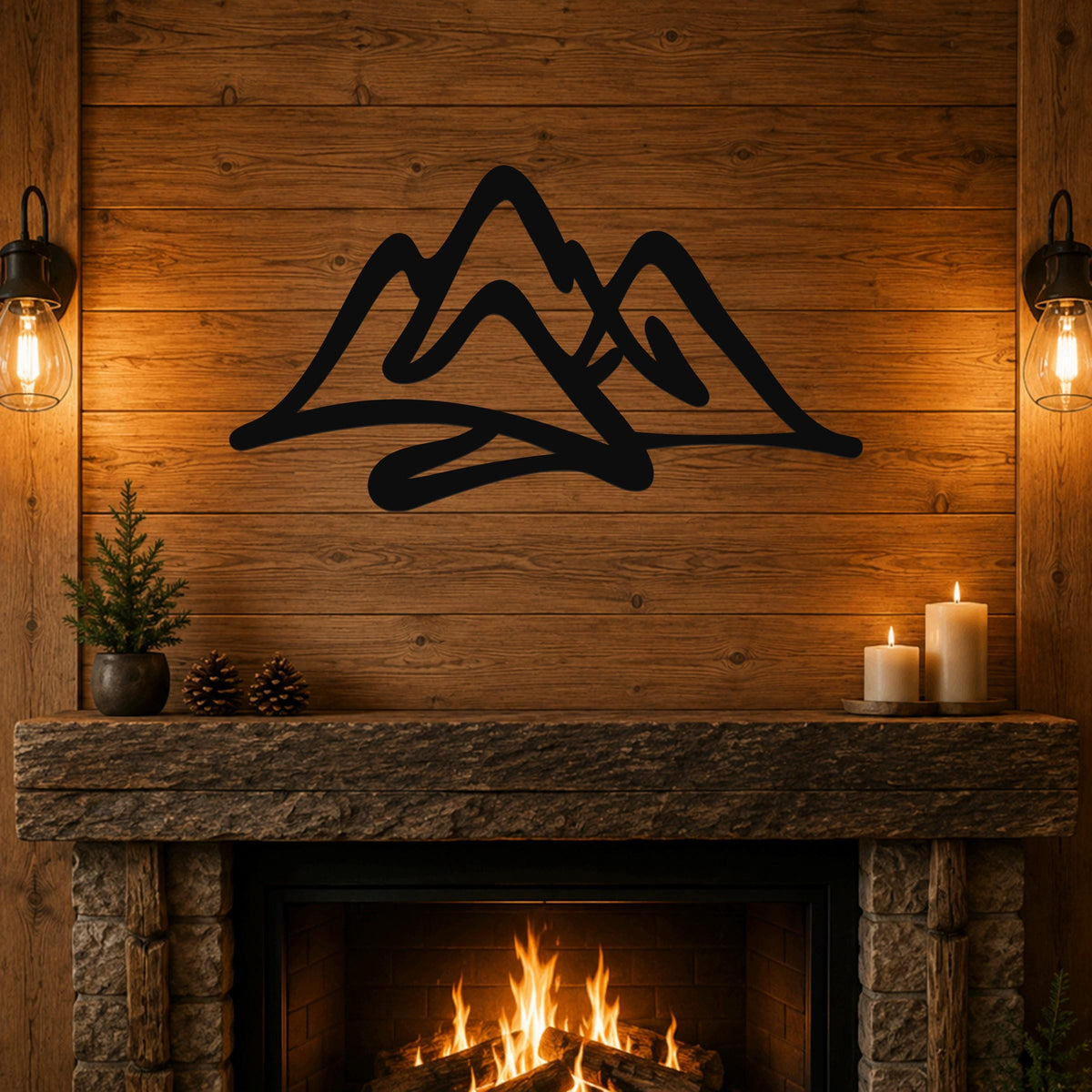 Black metal mountain silhouette wall art with layered peaks, mounted above a stone fireplace in a rustic cabin living room.