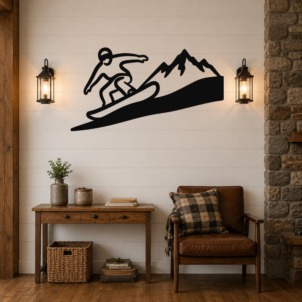 Black metal wall art featuring a snowboarder silhouette on a mountain slope, mounted above a wooden console table in a living room.