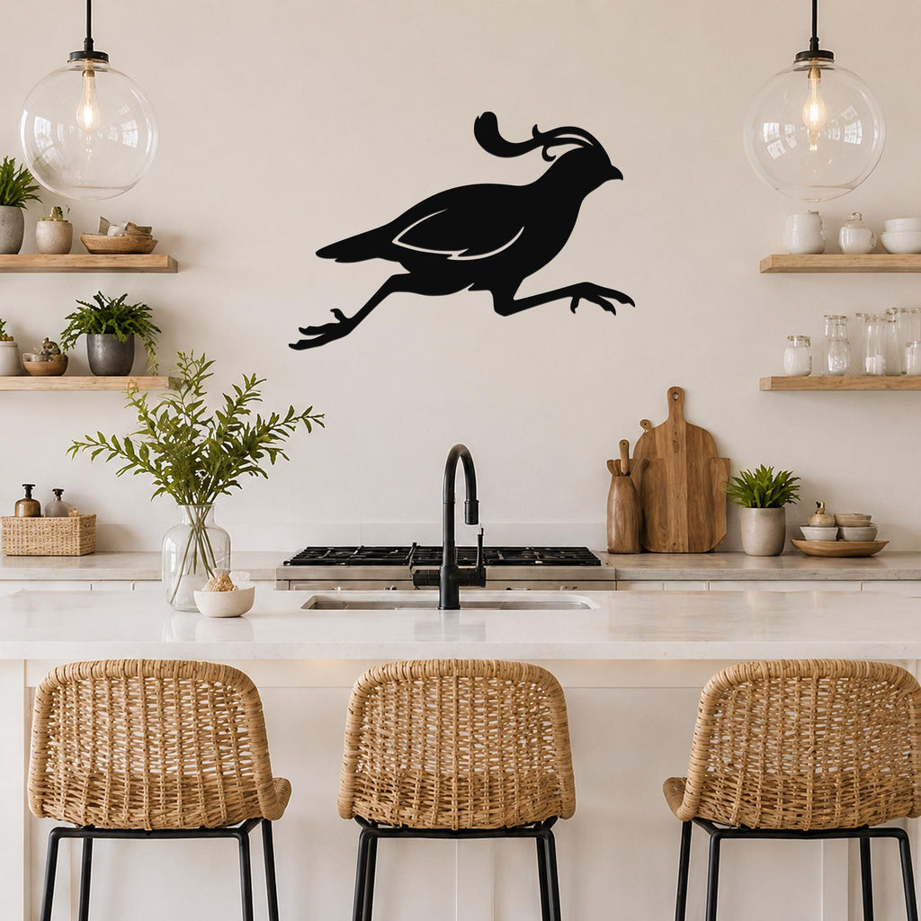 Black metal quail wall art in a running silhouette, mounted above a kitchen counter with wicker bar stools and open shelving.
