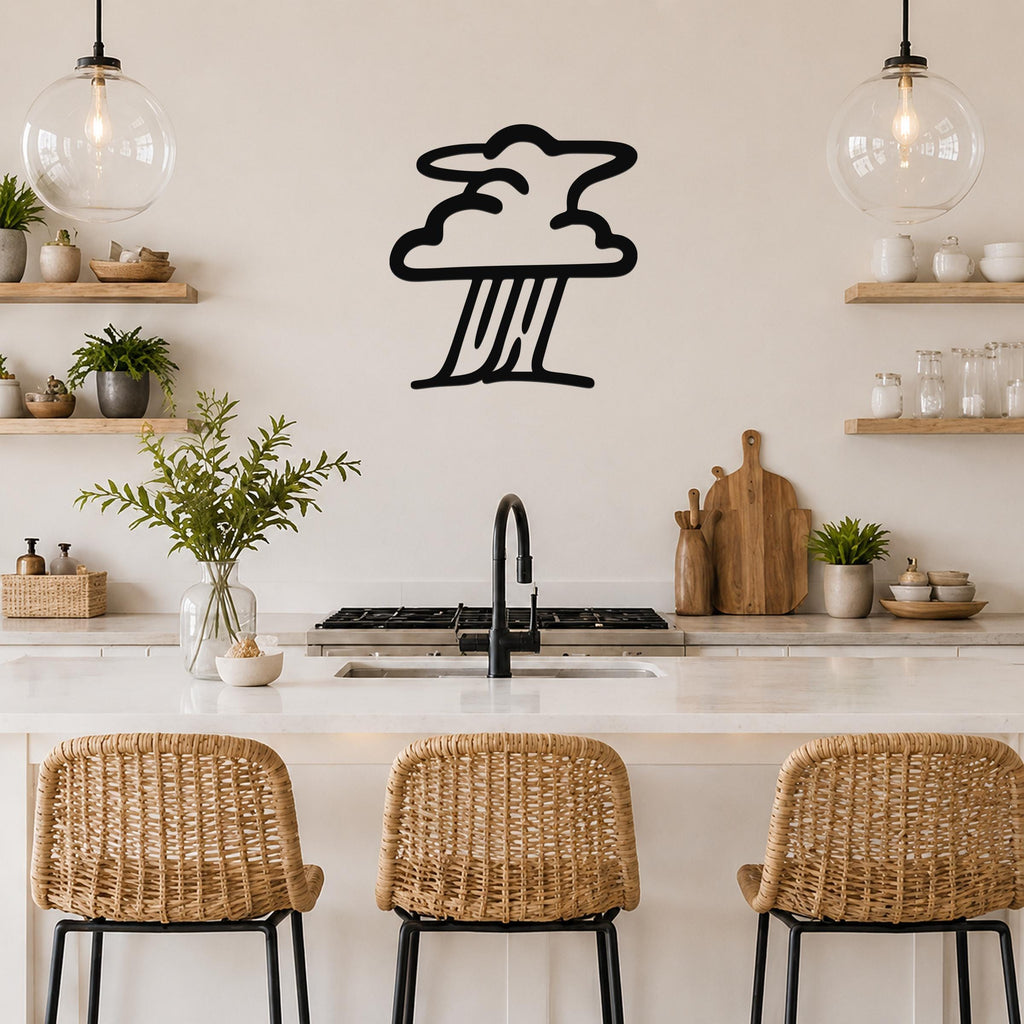 Black metal storm cloud wall art with raindrop cutouts, mounted on a kitchen wall above a counter.