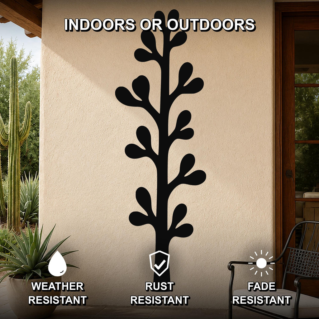 Black metal olive branch wall art with leaf cutouts, mounted on an outdoor patio wall, weather, rust, and fade resistant.
