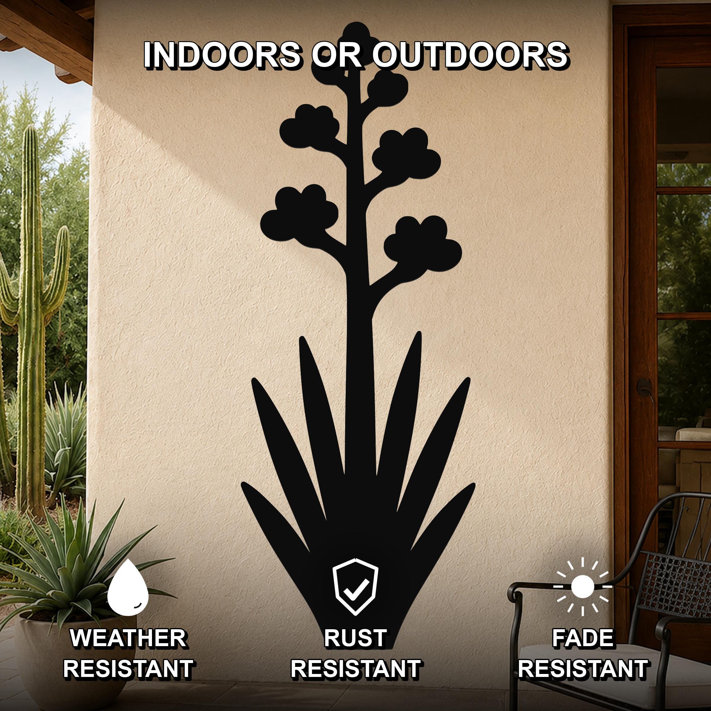Black metal agave wall art with blooming flower silhouette, mounted on an outdoor patio wall, weather, rust, and fade resistant.