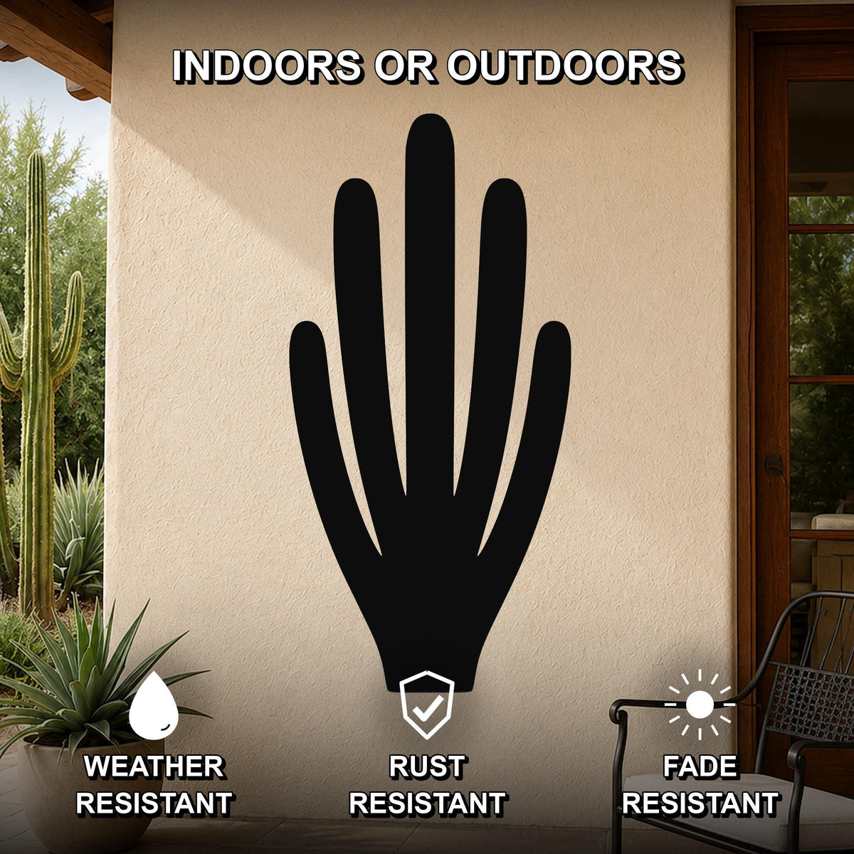 Black metal wall art shaped like an organ pipe cactus silhouette, mounted on an outdoor patio wall with weather, rust, and fade resistance features.