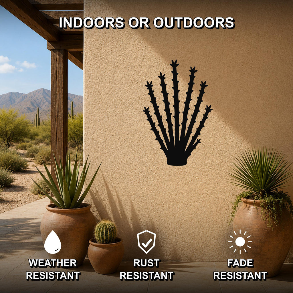 Black metal ocotillo wall art silhouette mounted on a beige outdoor wall, displayed on a patio with potted plants and desert scenery in the background.