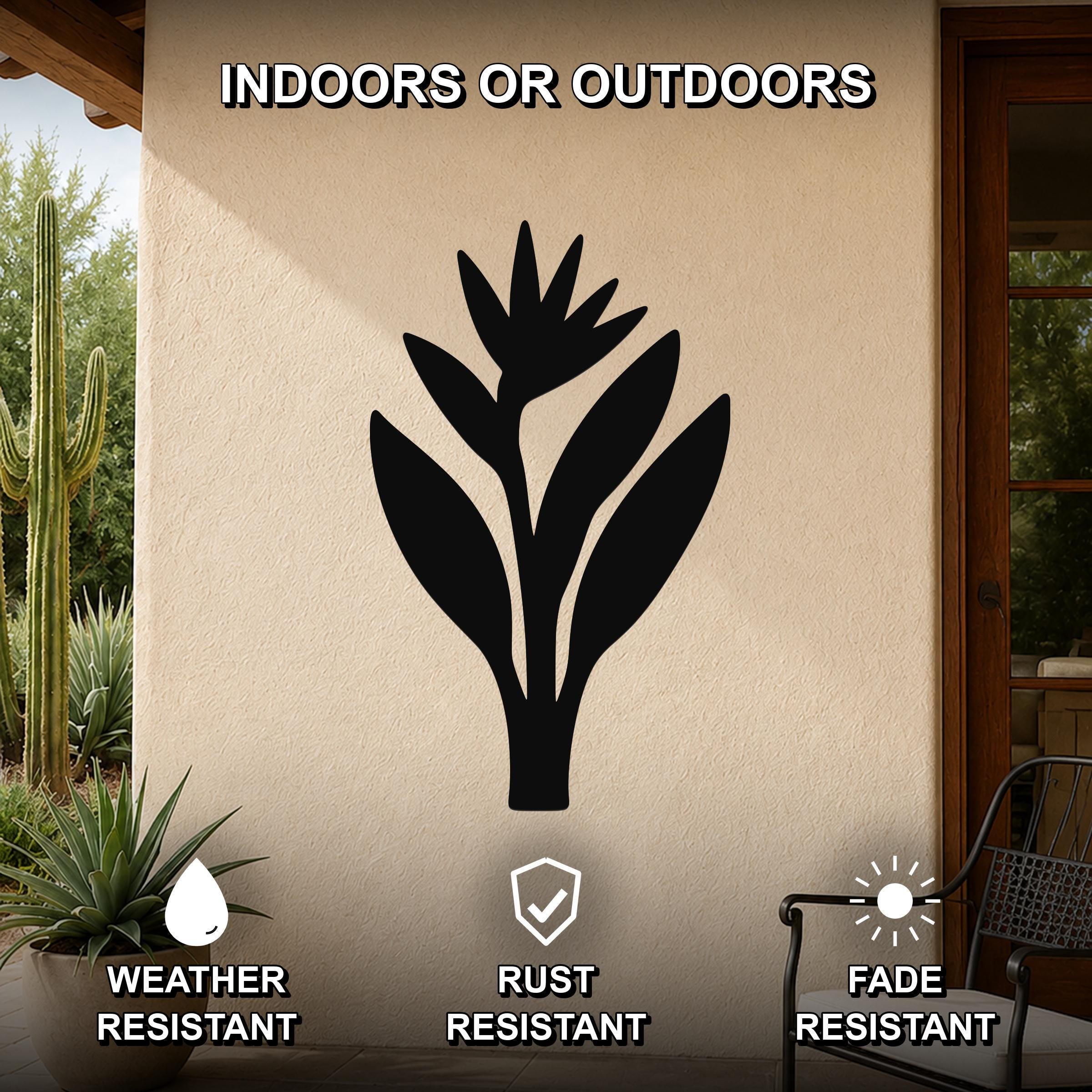 Black metal Bird of Paradise wall art silhouette mounted on an outdoor patio wall, weather resistant, rust resistant, and fade resistant.