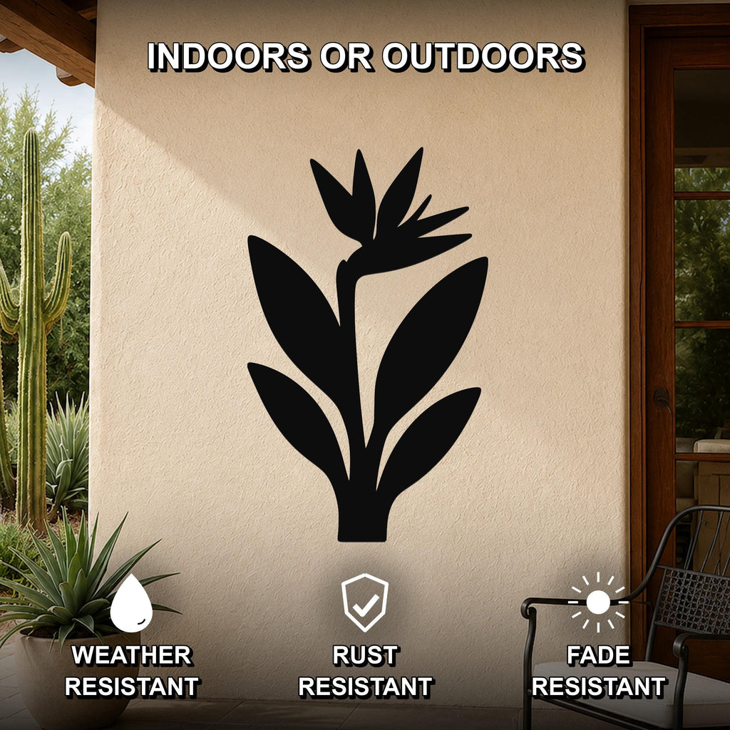 Black metal Bird of Paradise wall art silhouette mounted on an outdoor patio wall, weather resistant, rust resistant, and fade resistant.