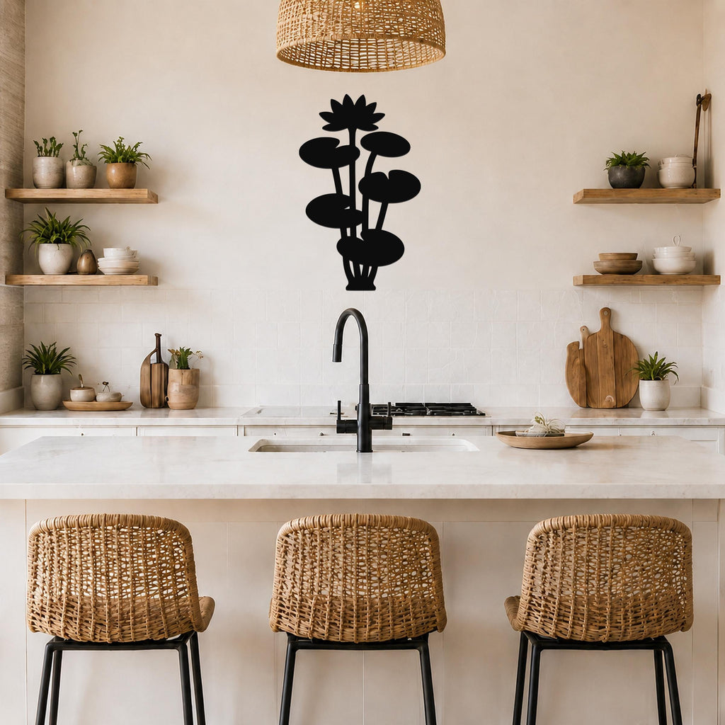 Black metal lotus water lily wall art with layered flower and leaf cutouts, mounted on a kitchen wall above a counter.