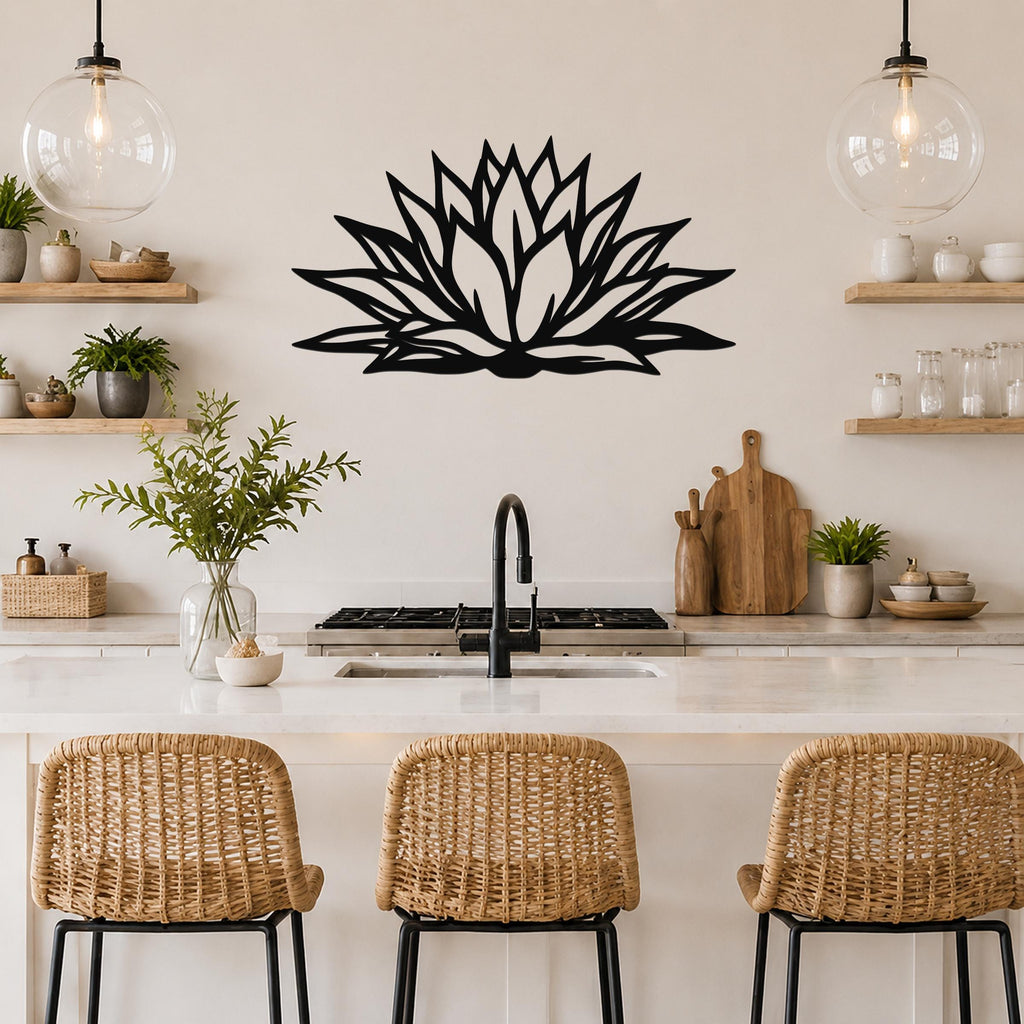 Black metal agave wall art with bold geometric cutouts, mounted on a kitchen wall above a counter.
