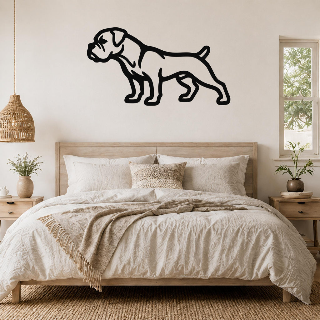 Black metal Boxer dog silhouette wall art mounted above a wooden bed in a neutral bedroom.