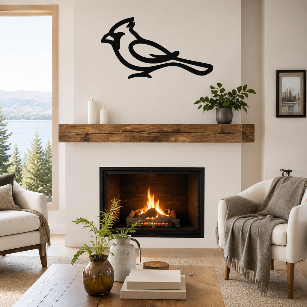 Black metal cardinal wall art with a bold silhouette design, mounted above a fireplace in a living room.