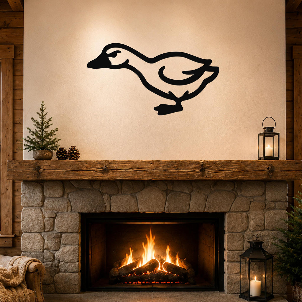 Black metal goose wall art silhouette with cutout details, mounted above a stone fireplace in a rustic living room.
