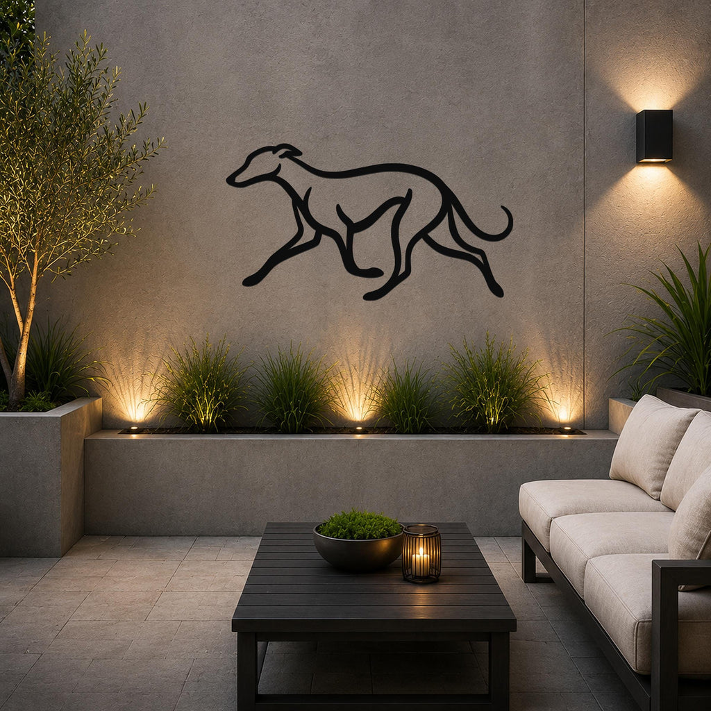 Black metal greyhound wall art with motion-line cutouts, mounted on a textured outdoor wall above a planter and sofa in a modern patio setting.