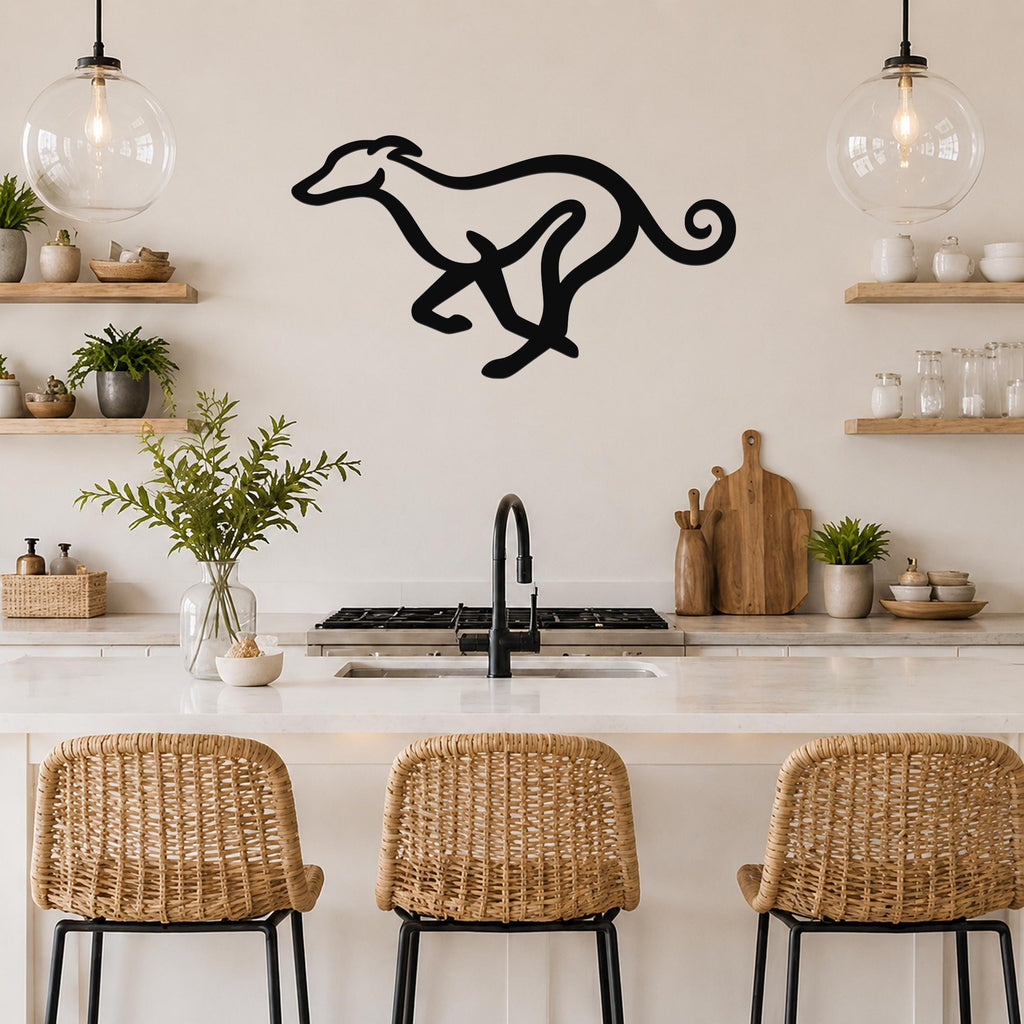 Black metal greyhound wall art in a running silhouette, mounted on a kitchen wall above a counter with wicker bar stools.