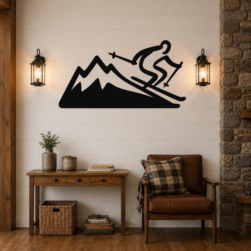 Black metal wall sculpture of a skier on a mountain slope, mounted above a wooden console table in a living room with stone and wood accents.