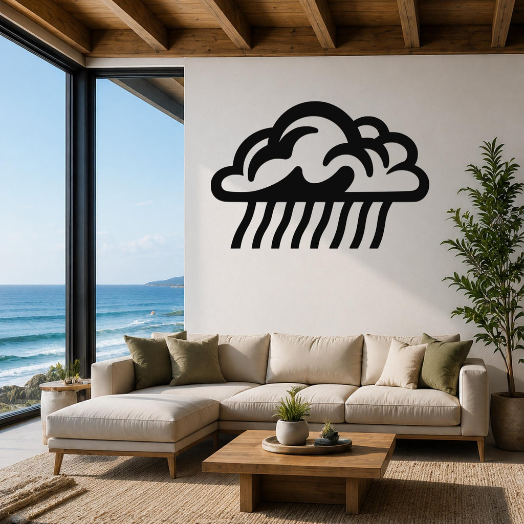 Black metal rain cloud wall art with raindrop cutouts, mounted on a white wall above a beige sofa in a living room with ocean views.